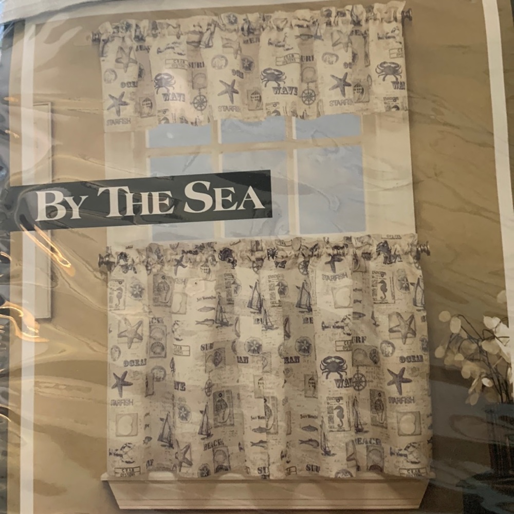 Beautiful Beach curtains with starfish, crabs, and compass.